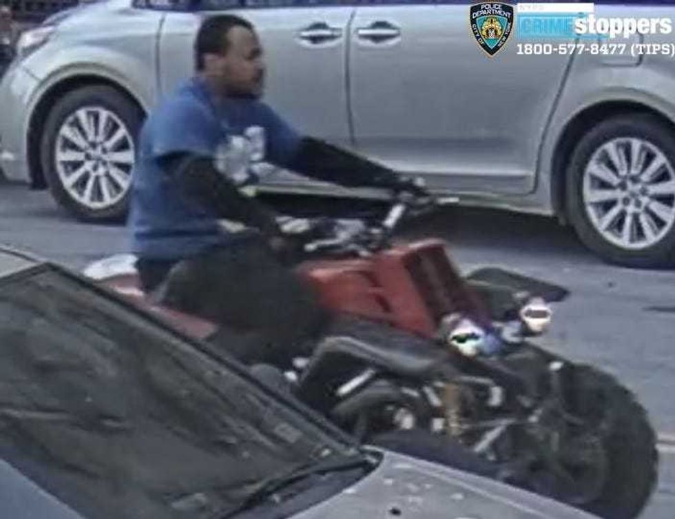 One of the suspects riding an ATV