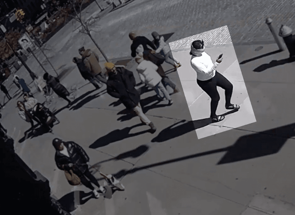 One of the three suspects sought in the armed robbery