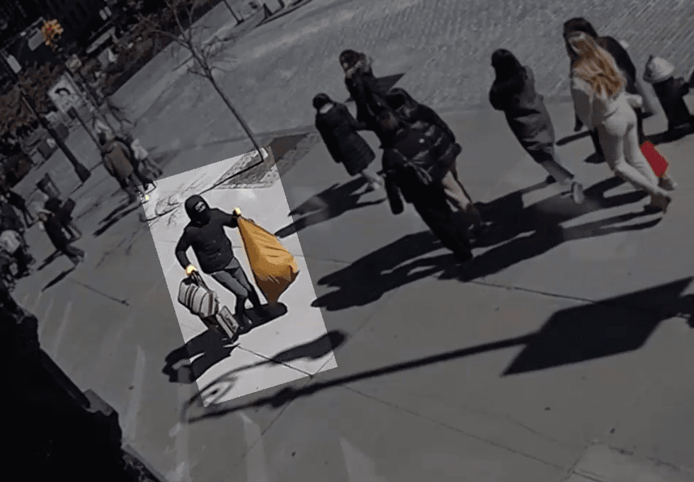 One of the three suspects sought in the armed robbery