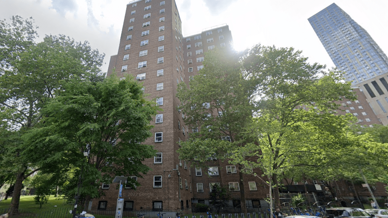 One of the towers at the Carver Houses, where a 25-year-old man was killed on Friday night.