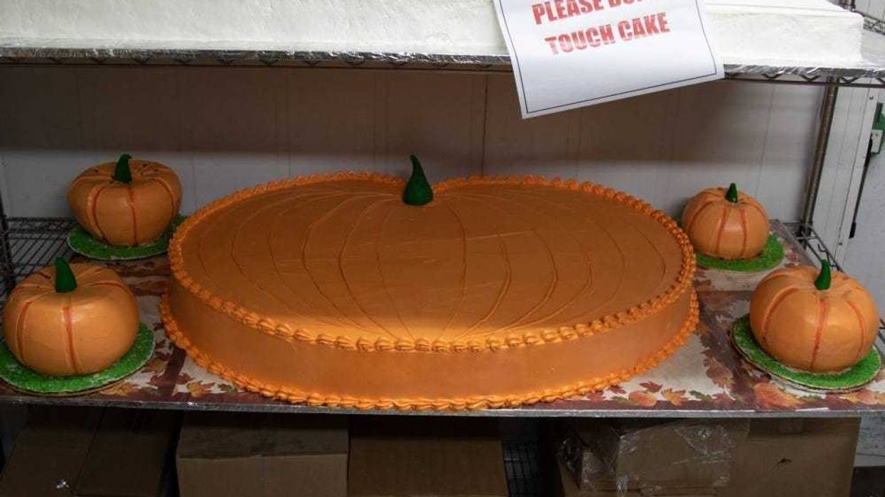 One the menu for the Zone 6 Dining Facility at Camp Arifjan this year: roasted turkey, shrimp cocktail, green beans and ribeye roasts. There are also pies - pumpkin, sweet potato, pecan and apple - and cakes such as this pumpkin-shaped one.