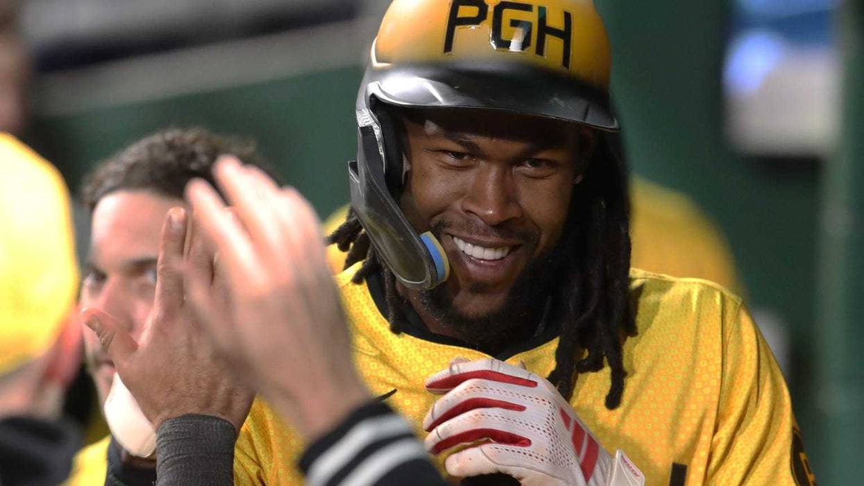 Oneil Cruz celebrating in dugout