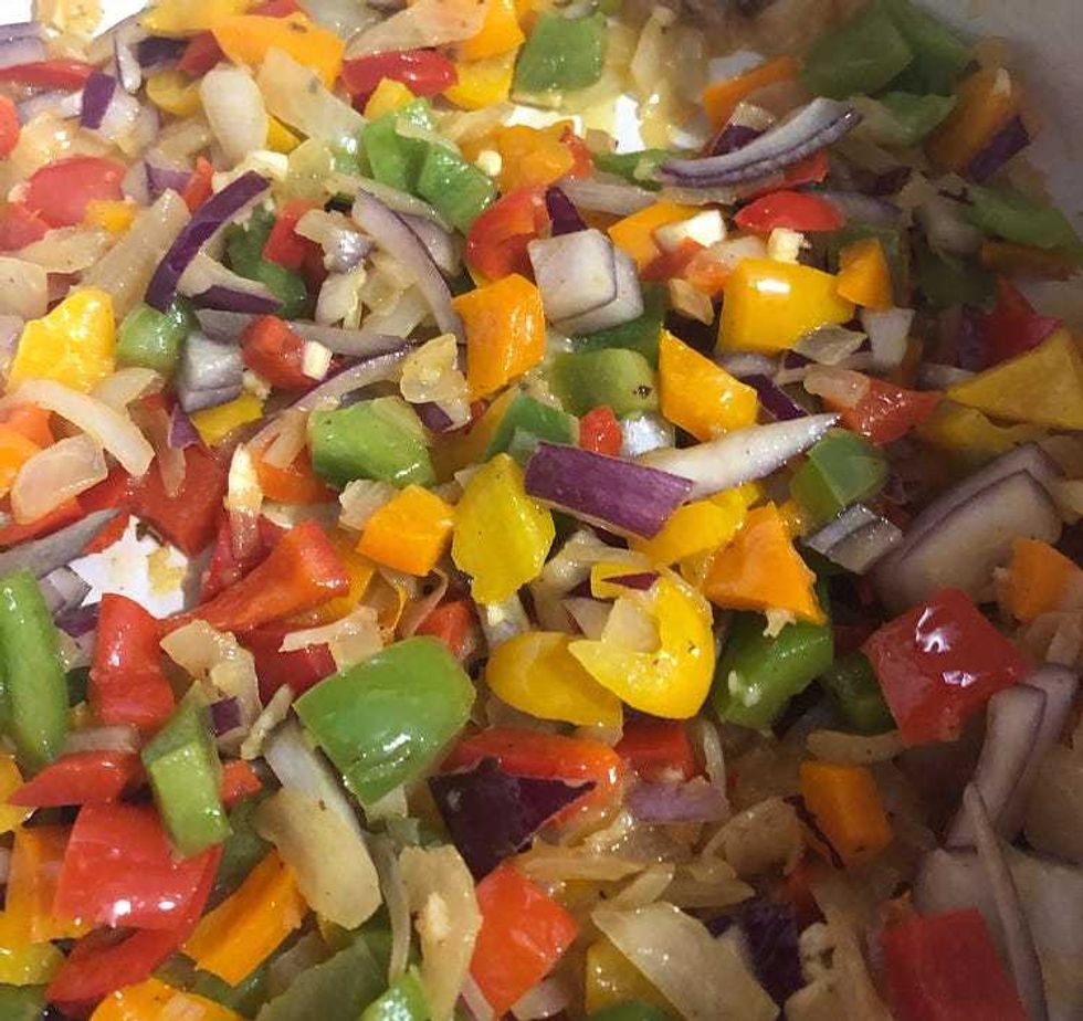 Onions and peppers on stove