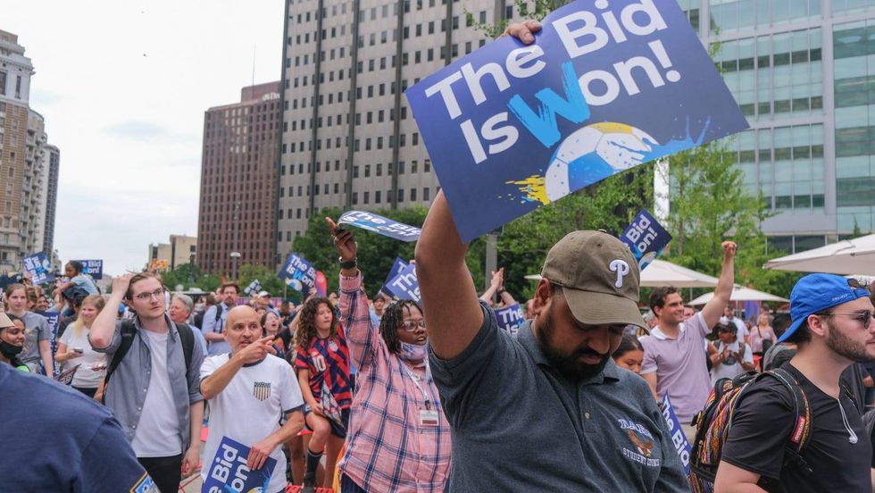 Onlookers celebrate after Philadelphia is announced.