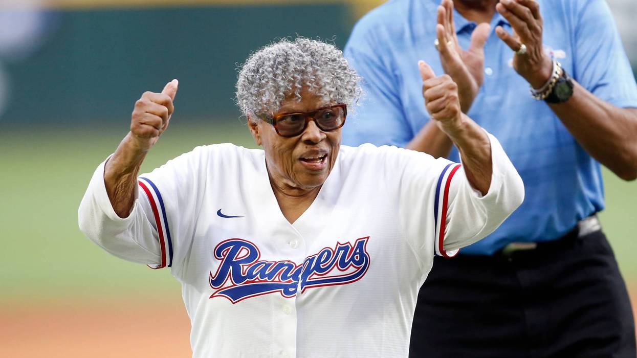 Opal Lee reacts after throwing out the first pitch before the game between the Texas Rangers and the Los Angeles Angels at Globe Life Field on April 15, 2022, in Arlington, Texas.
