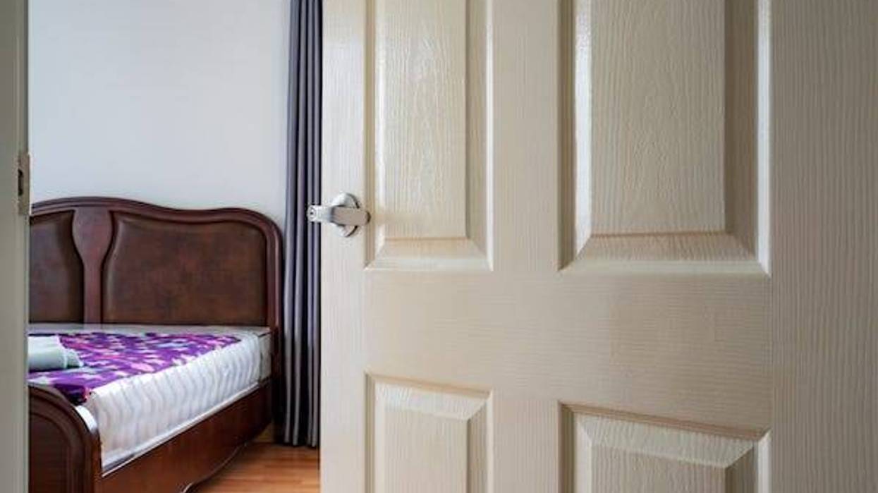 Open door to empty bedroom