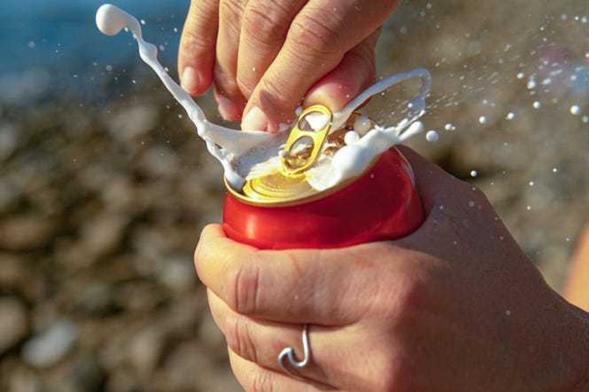 opening beer can