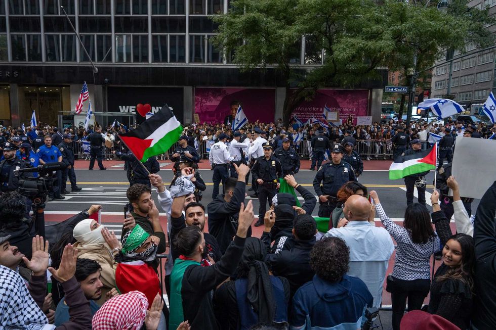 Opposing groups protest near the Israeli consulate on Oct. 8, 2023 in New York City
