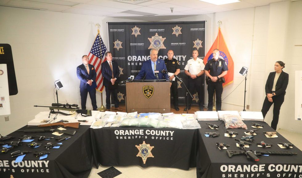 Orange County District Attorney David Hoover speaks during press conference announcing the success of Operation Hot Lunch at the Orange County Sheriff