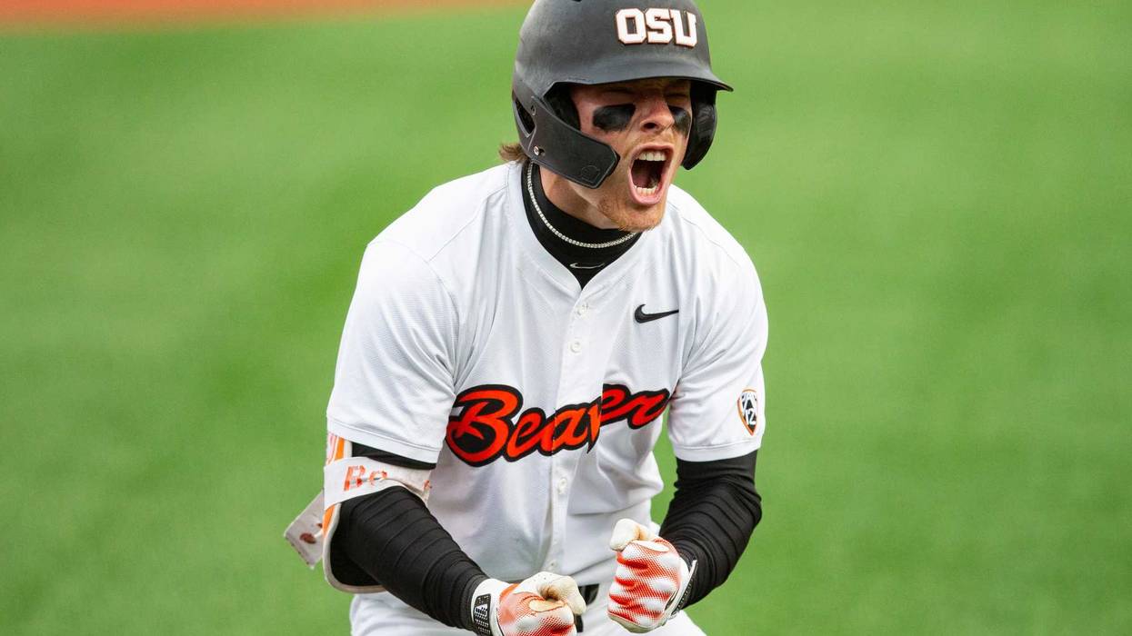 Oregon State's Travis Bazzana (37) celebrates after hitting the team's second solo home run during an NCAA college baseball game against Oregon at Goss Stadium on Friday, April 26, 2024, in Corvallis, Ore.