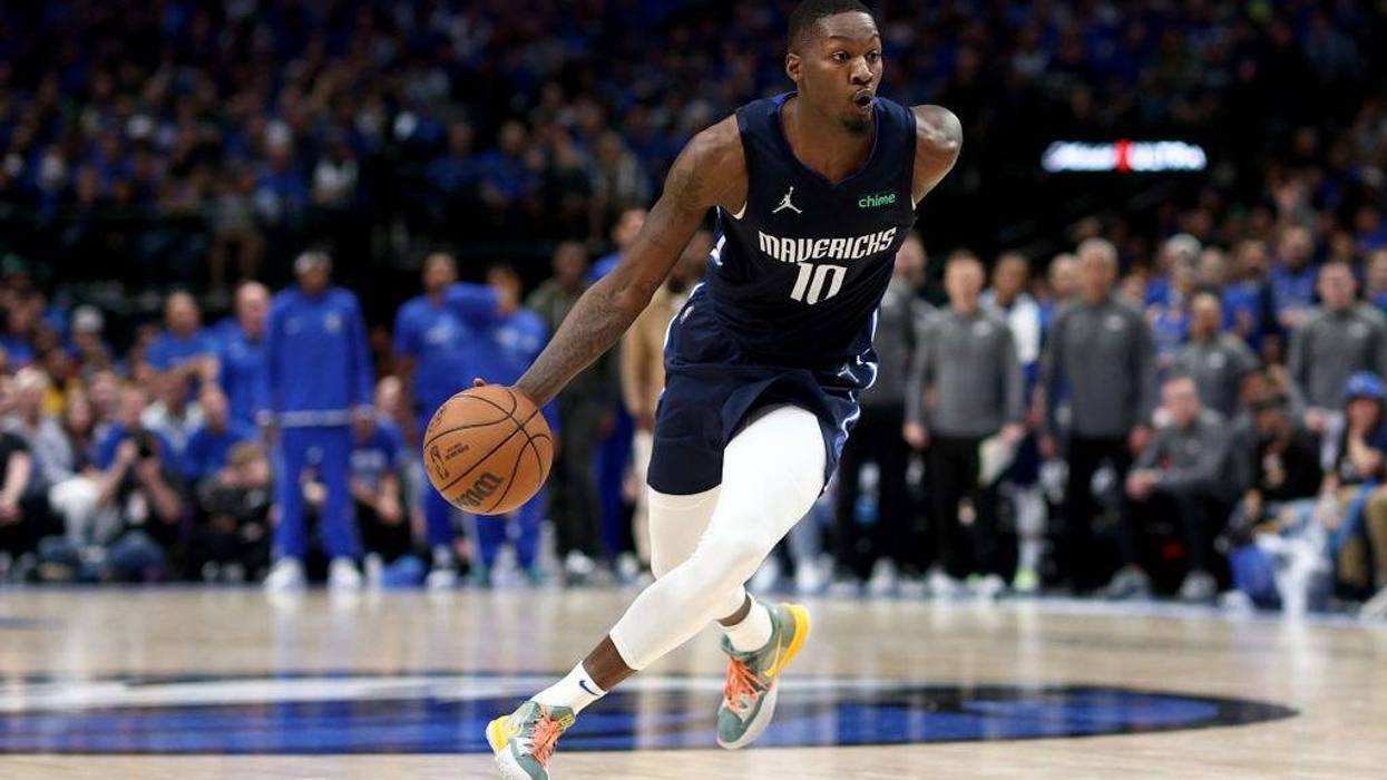 orian Finney-Smith #10 of the Dallas Mavericks dribbles the ball against the Utah Jazz in the second quarter of Game One of the Western Conference First Round NBA Playoffs at American Airlines Center on April 16, 2022 in Dallas, Texas