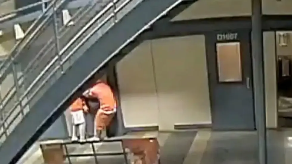 Orleans Parish jail inmates tugging on cell doors