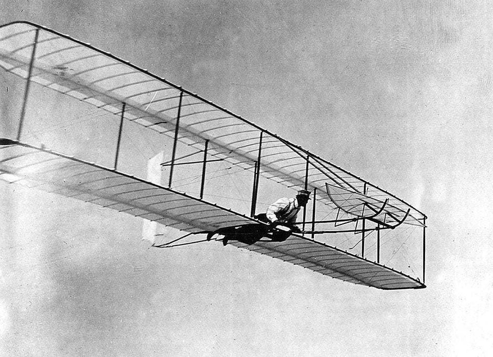 Orville Wright flies a glider in Kitty Hawk, NC in 1902. (Photo by National Archive/Newsmakers)