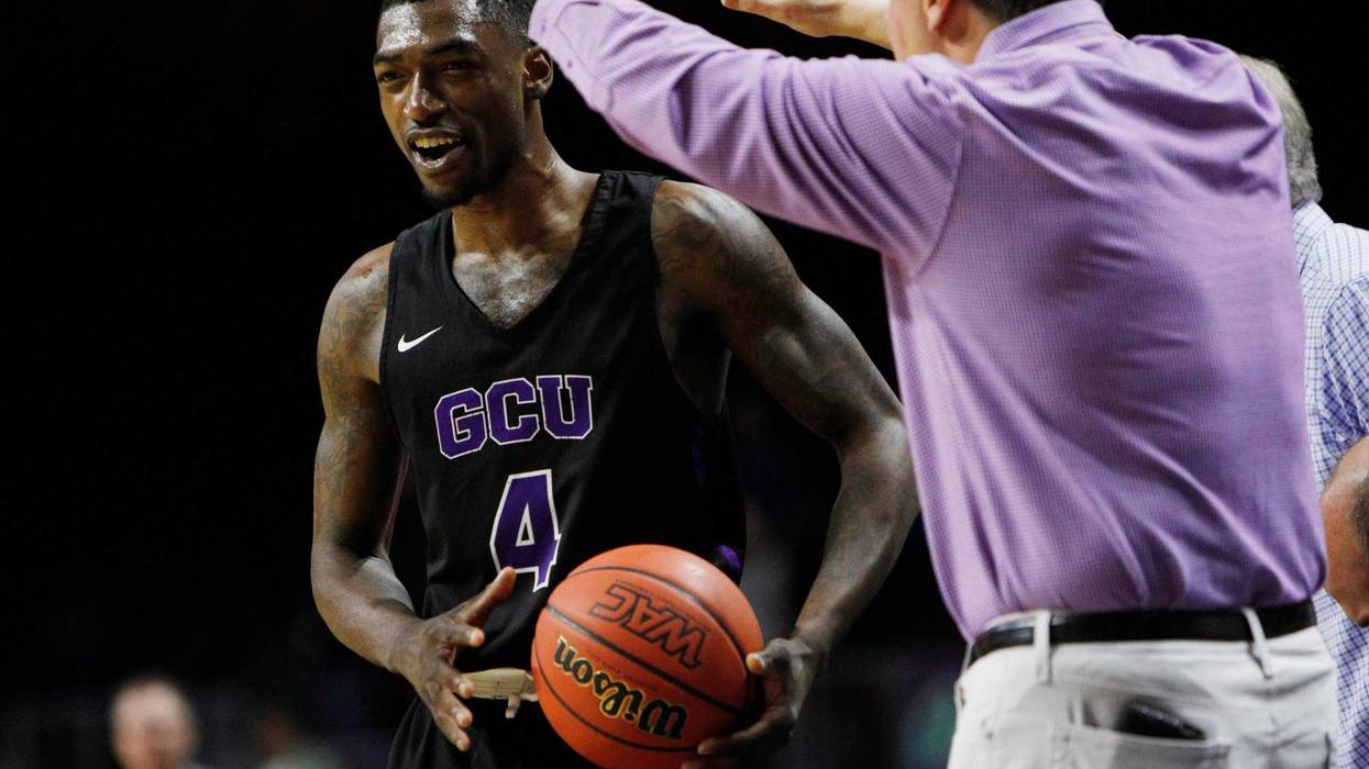 Oscar Frayer #4 of the Grand Canyon Lopes is cheered on by fans against the Utah Valley Wolverines during a semifinal game of the Western Athletic Conference basketball tournament at the Orleans Arena on March 15, 2019 in Las Vegas, Nevada. Grand Canyon won 78-74.