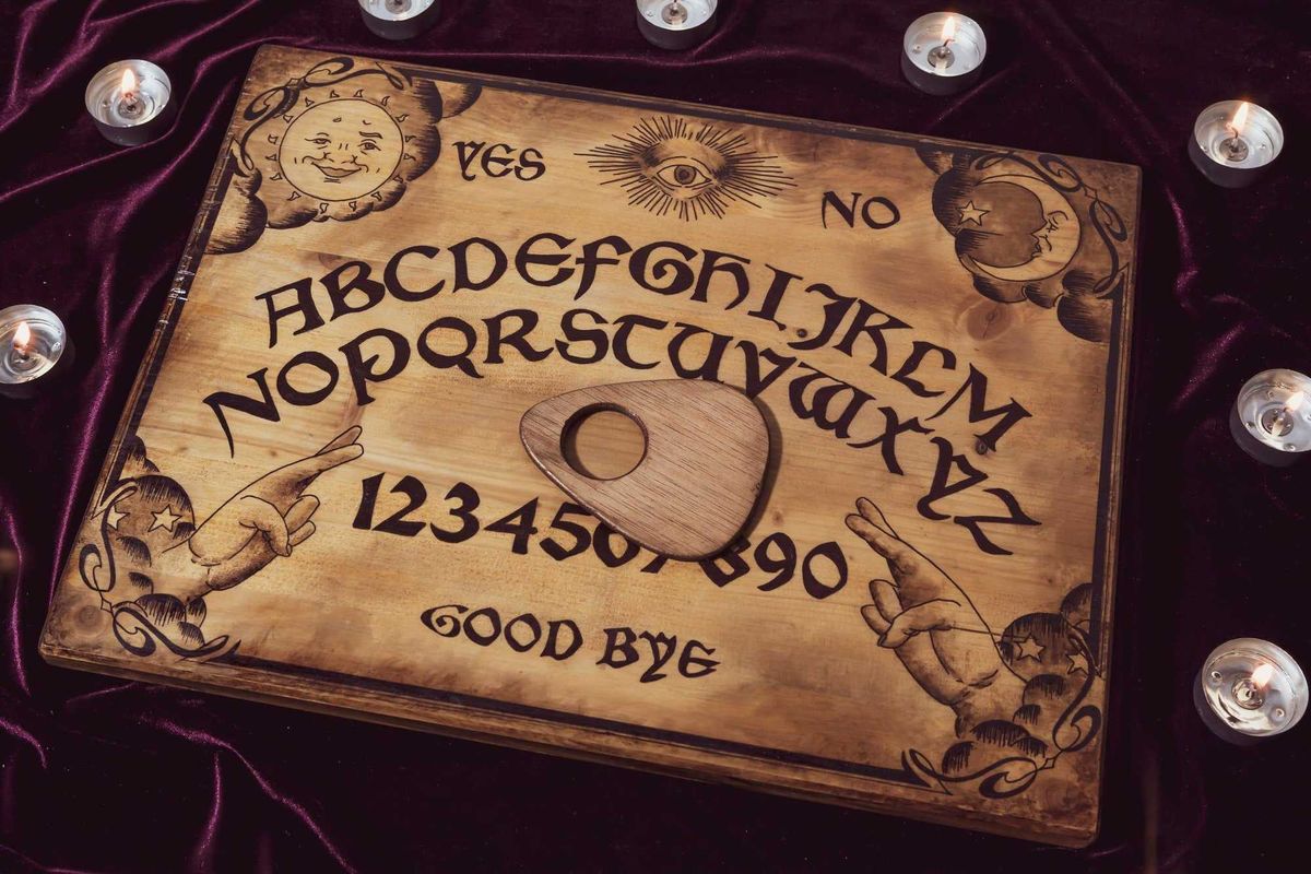 Ouija board stock photo.