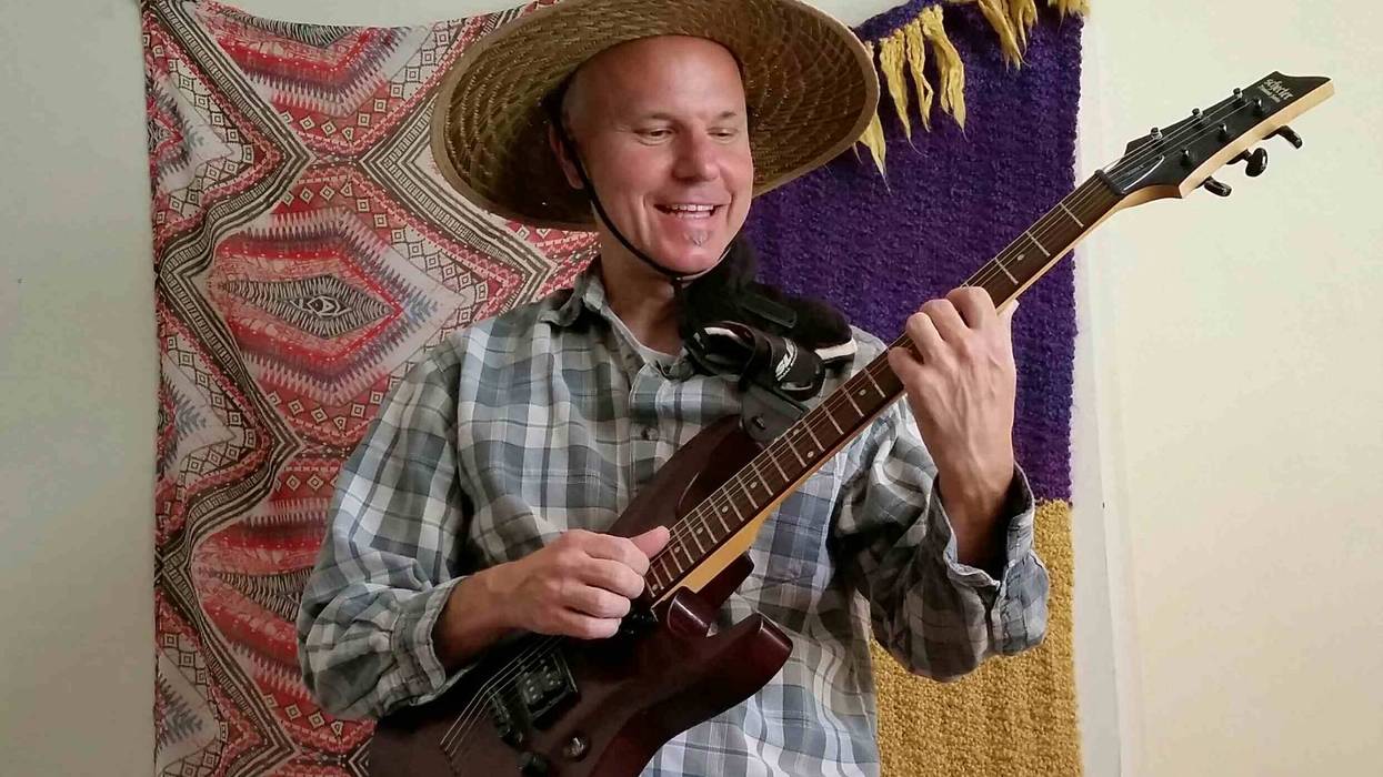 Our KNX Hero of the Week, Brian Duncan of Respect and Understanding playing guitar