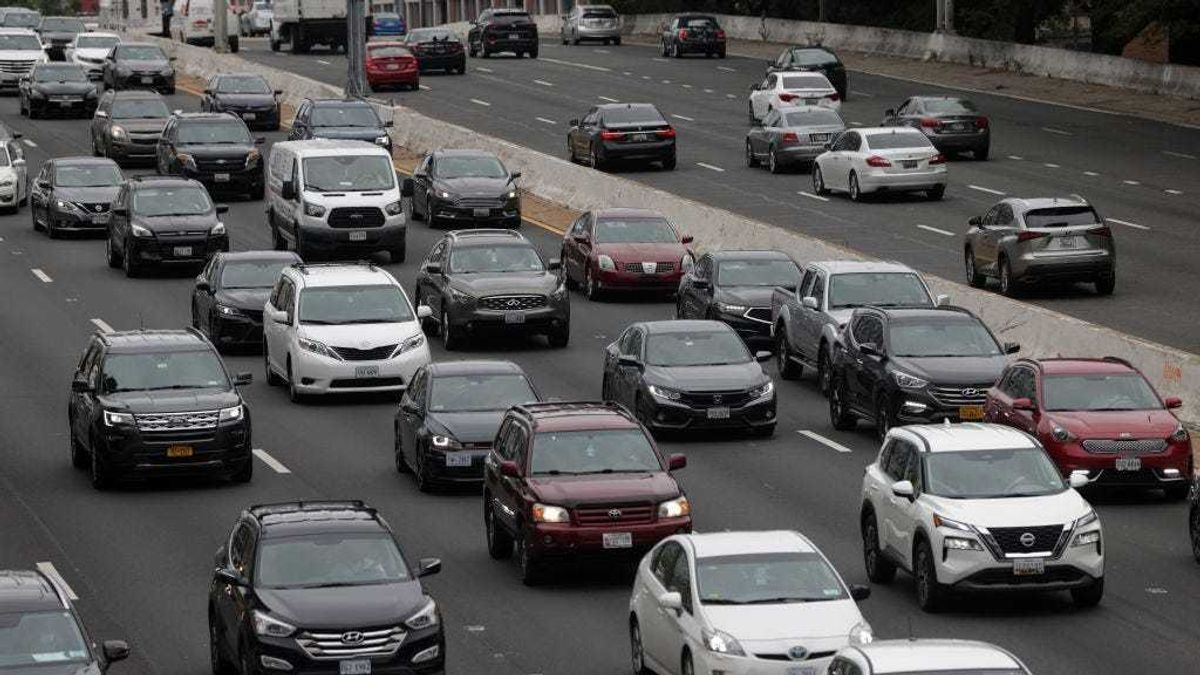 Outgoing traffic is seen on I-395 on the eve of Memorial Day long weekend May 28, 2021 in Washington, DC.