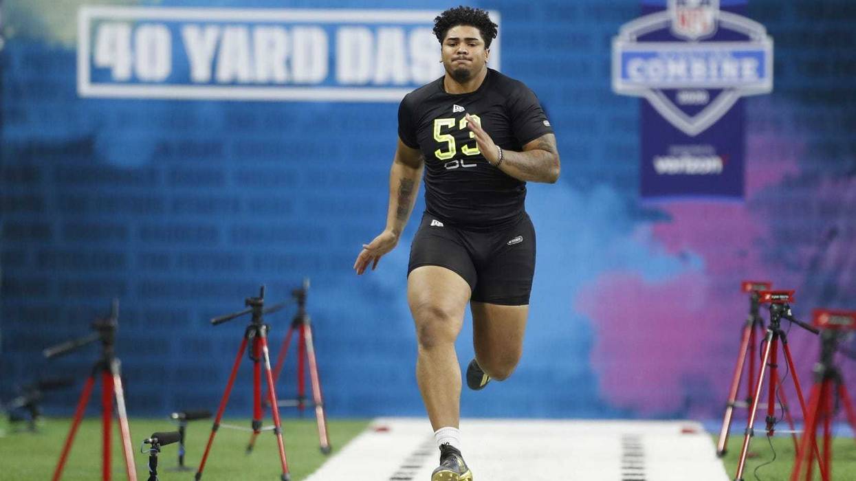 owa Hawkeyes offensive lineman Tristan Wirfs (OL53) runs the 40 yard dash during the 2020 NFL Combine at Lucas Oil Stadium.