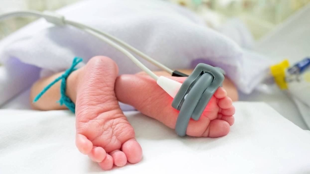 Oxygen monitor on baby's feet