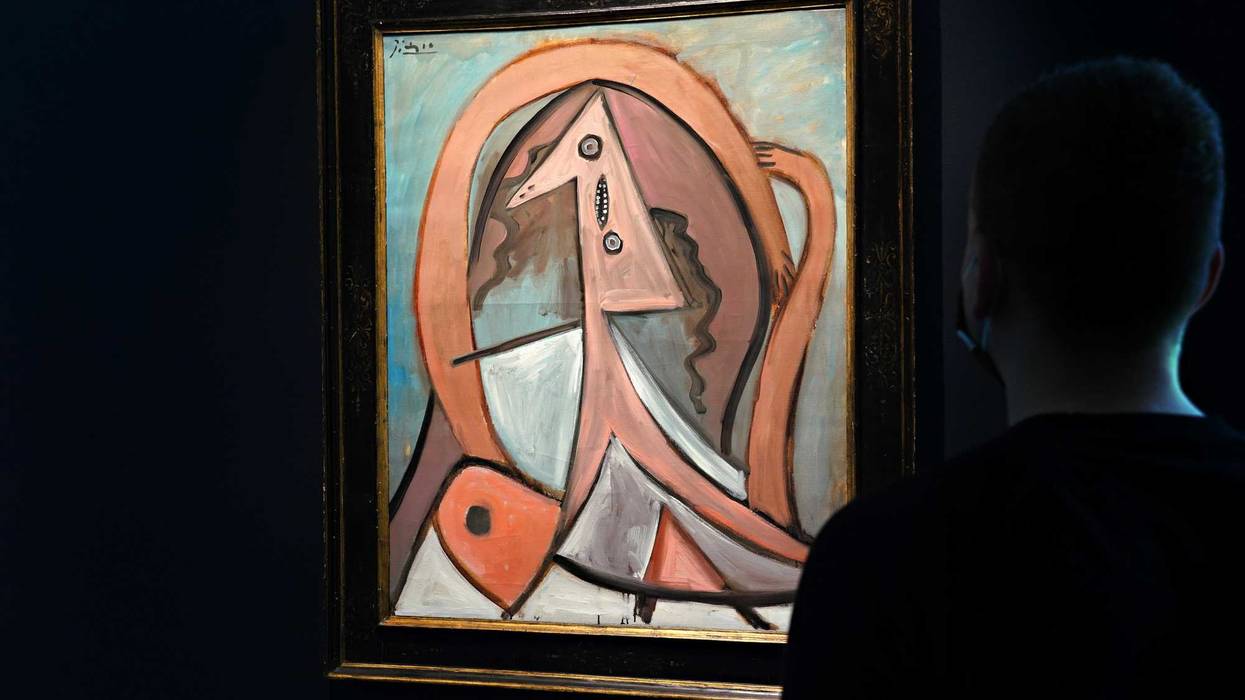 Pablo Picasso's Femme Assise is exhibited at Sotheby's in New York.