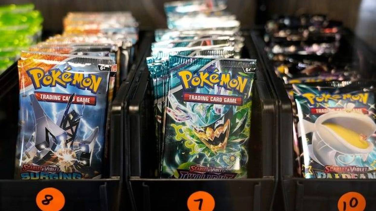 Packs of Pokémon cards on display