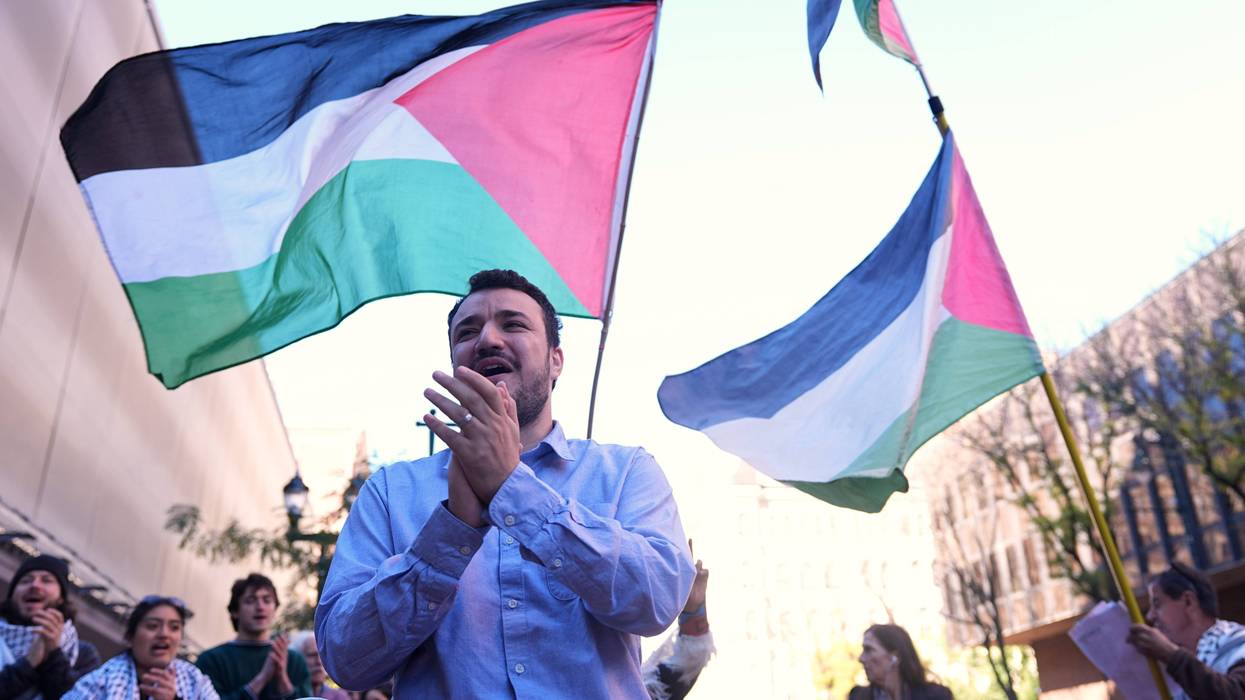 Palestinian activist Mahmoud Khalil meets with supporters outside federal court on Oct. 21, 2025, in Philadelphia.