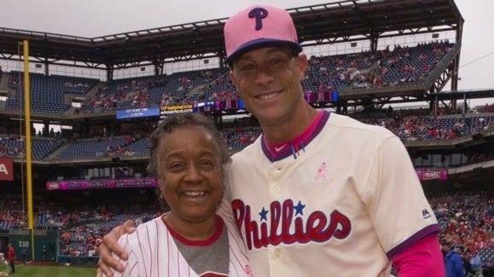 Pam Hall poses for a photo with former Phillies manager Gabe Kapler.