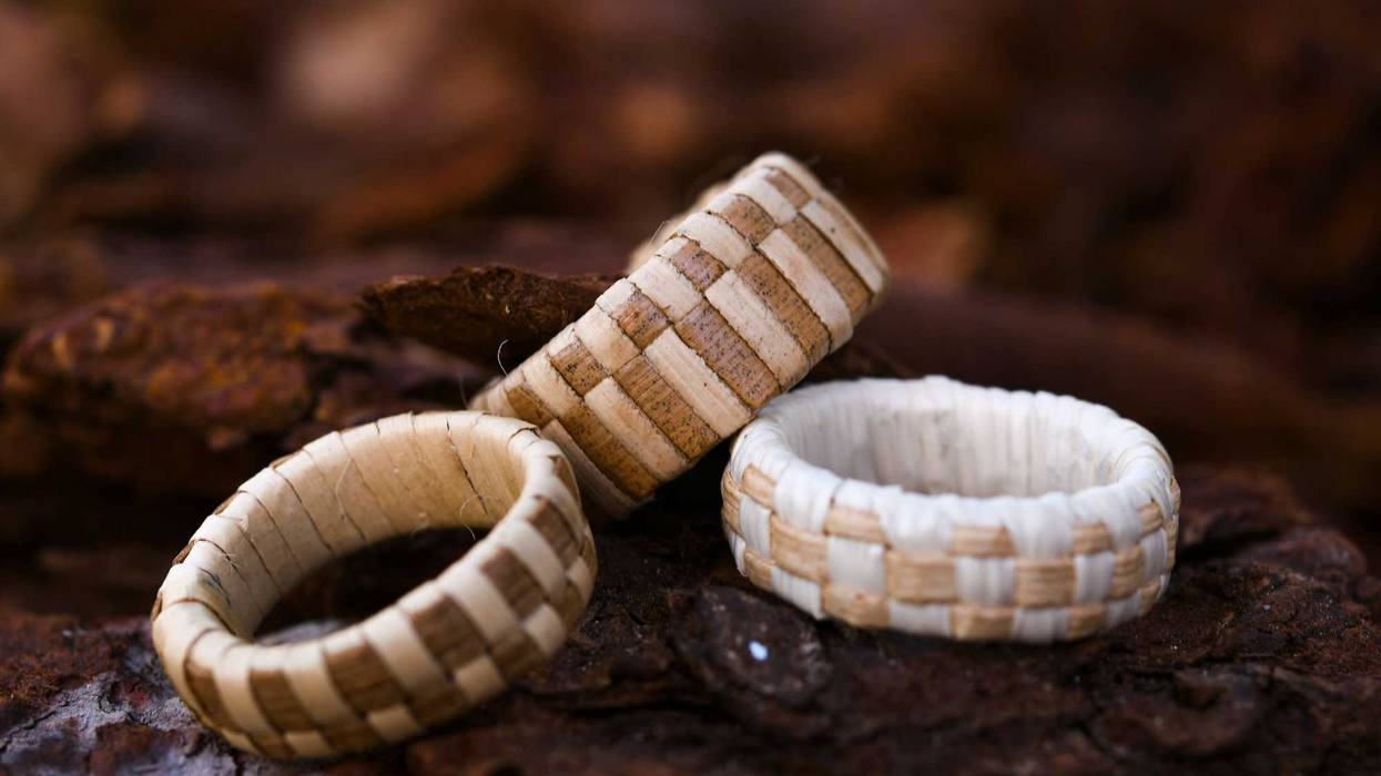 Pandanus wedding bands created by CHamoru weaver Mark Benavente. The rings, which are made from dried and dethorned pandanus leaves, are nearly waterproof. Bridal Woven Ring 05