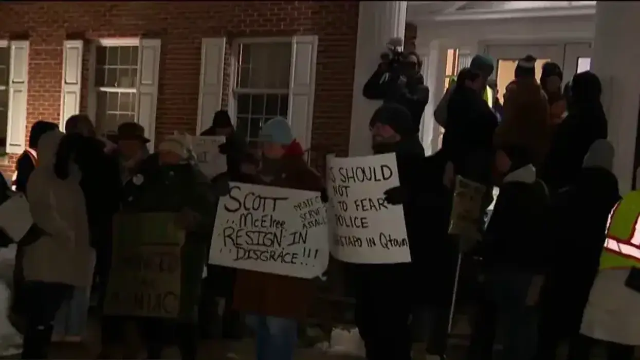 Parents and community members protest outside a Quakertown Borough Council meeting on Feb. 23, 2026, demanding the dismissal of Quakertown Police Chief Scott McElree.
