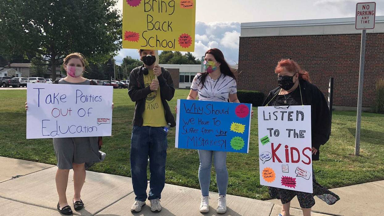 Parents and students gather outside Williamsville's district offices to protest remote learning. September 14, 2020
