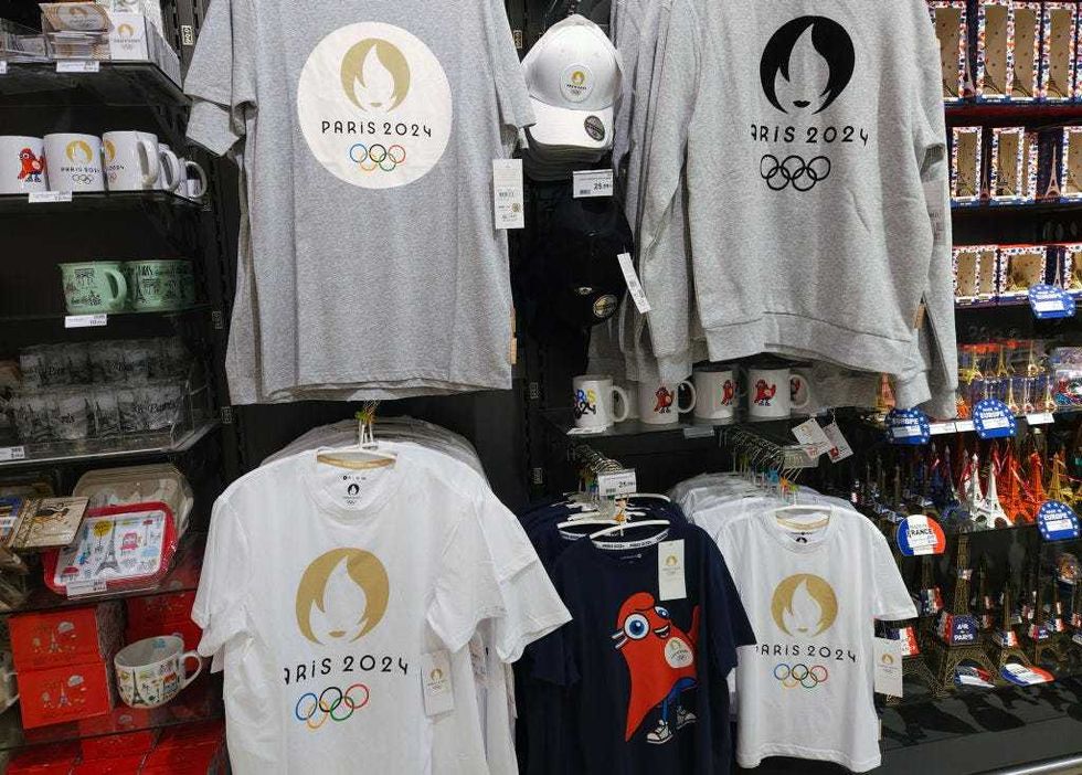 Paris Olympics 2024 accessories, gifts and merchandise on display in a shop at Paris Charles de Gaulle Airport, on August 14, 2023, in Roissy-en-France, France.