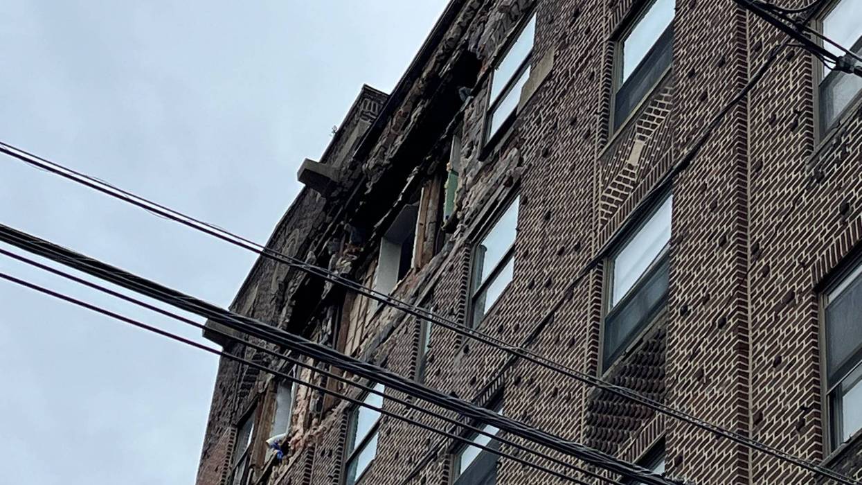 Part of the collapsed Lindley Towers apartments.