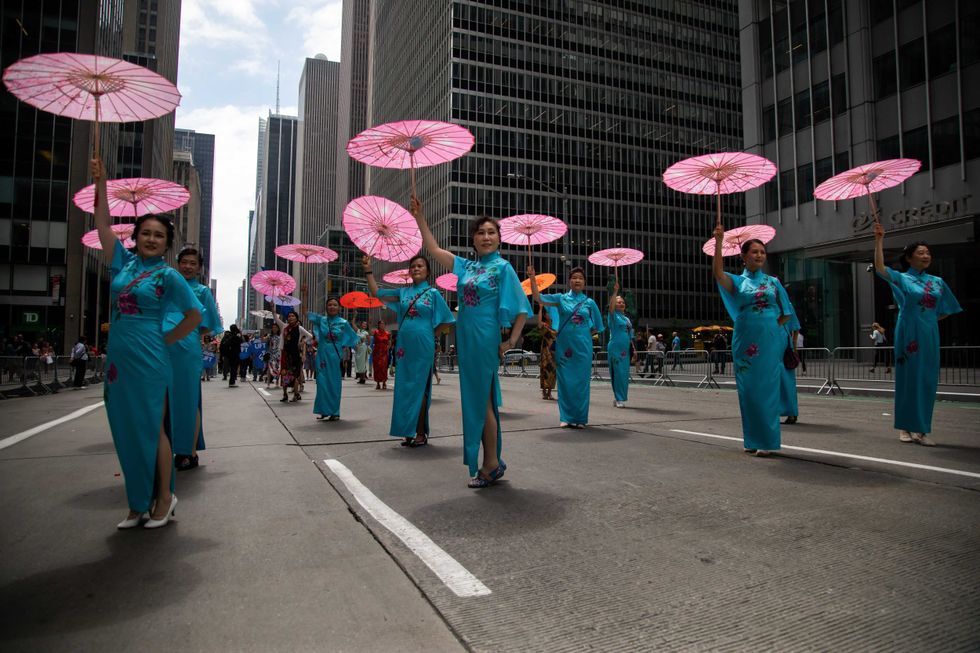 Participants perform during the first-ever annual Asian American and Pacific Islander AAPI Cultural and Heritage Parade in New York, the United States, May 15, 2022.