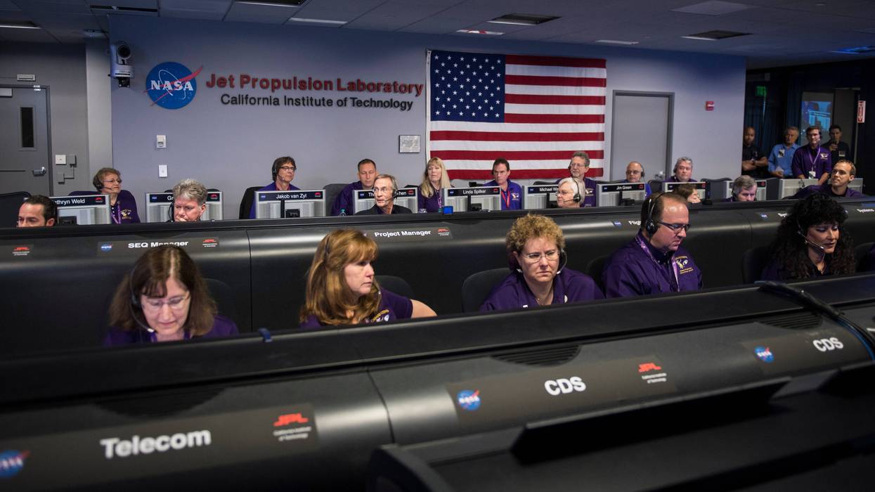 PASADENA, CA - SEPTEMBER 13: Cassini program manager at JPL, Earl Maize, center row, calls out the end of the Cassini mission, September 15, 2017 at NASA's Jet Propulsion Laboratory in Pasadena, California. Since its arrival in 2004, the Cassini-Huygens mission has been a discovery machine, revolutionizing our knowledge of the Saturn system and captivating us with data and images never before obtained with such detail and clarity. On Sept. 15, 2017, operators deliberately plunged the spacecraft into Saturn, as Cassini gathered science until the end. Loss of contact with the Cassini spacecraft occurred at 7:55 a.m. EDT (4:55 a.m. PDT). The "plunge" ensures Saturn's moons will remain pristine for future exploration. During Cassini's final days, mission team members from all around the world gathered at NASA's Jet Propulsion Laboratory, Pasadena, California, to celebrate the achievements of this historic mission.