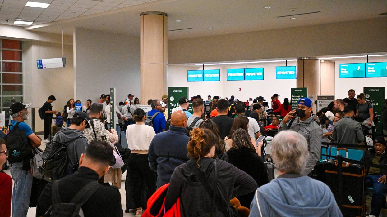 Passengers wait at Luis Munoz Marin International Airport as all flights are cancelled following US military action in Venezuela, on January 3, 2026, in Carolina, Puerto Rico.