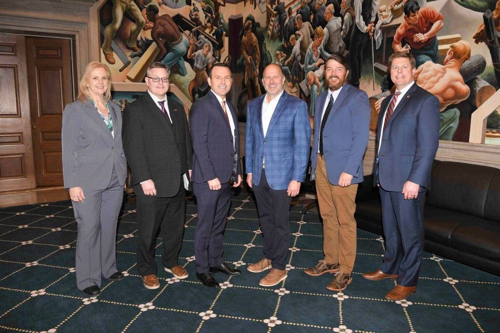 Past Missouri House speakers, from left, Catherine Hanaway, Rod Jetton, Steven Tilley, John Diehl and Todd Richardson pose with current Speaker Dean Plocher during a dinner hosted in the House Lounge on March 12, 2024. The event took place shortly after Plocher testified to the House Ethics Committee