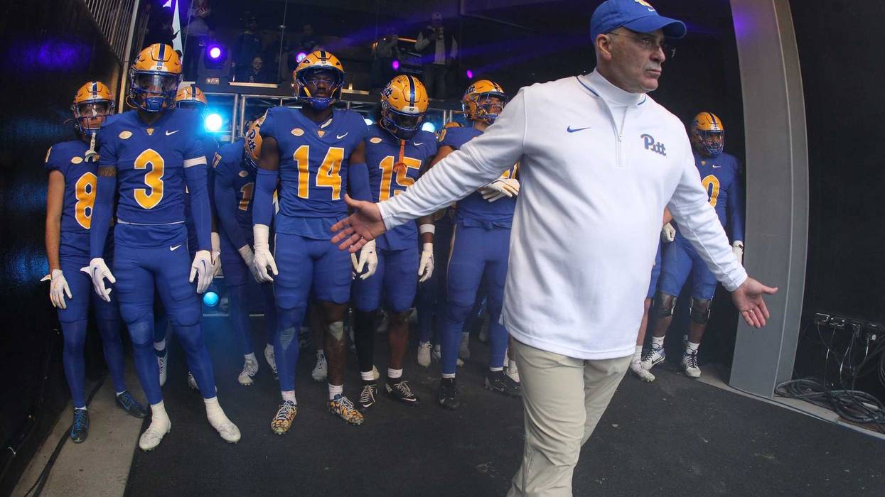 Pat Narduzzi leads team out onto field