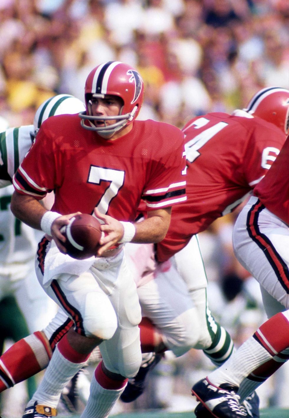 Pat Sullivan handing off the ball