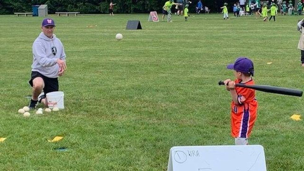 Patrick coaching his son at Whitpain Recreation Association.