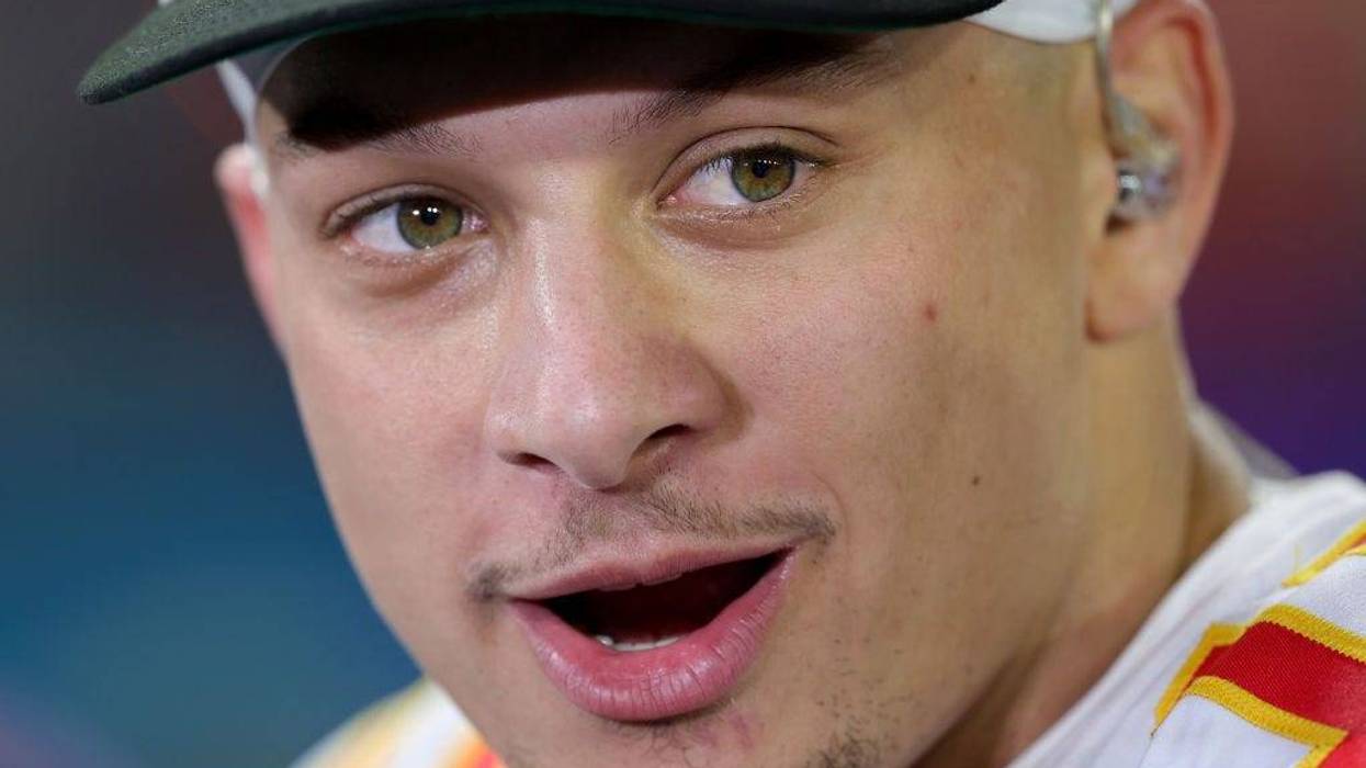 Patrick Mahomes #15 of the Kansas City Chiefs looks on while being interviewed after defeating the Philadelphia Eagles in Super Bowl LVII at State Farm Stadium on February 12, 2023 in Glendale, Arizona