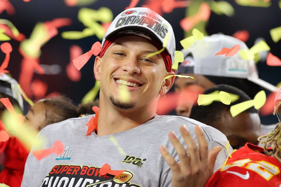 Patrick Mahomes celebrates. his Super Bowl MVP award.