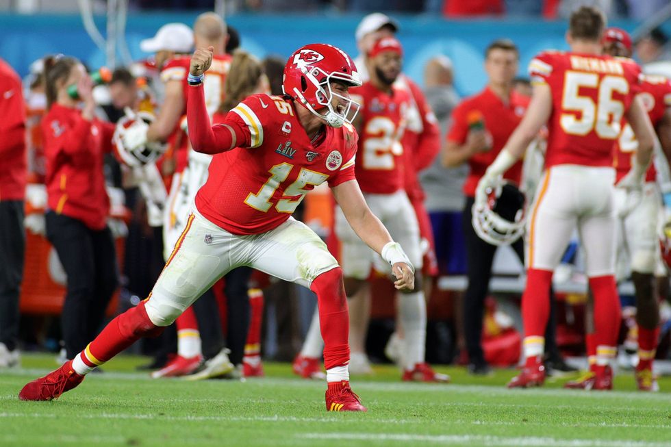 Patrick Mahomes reacts to a touchdown pass during Super Bowl LIV