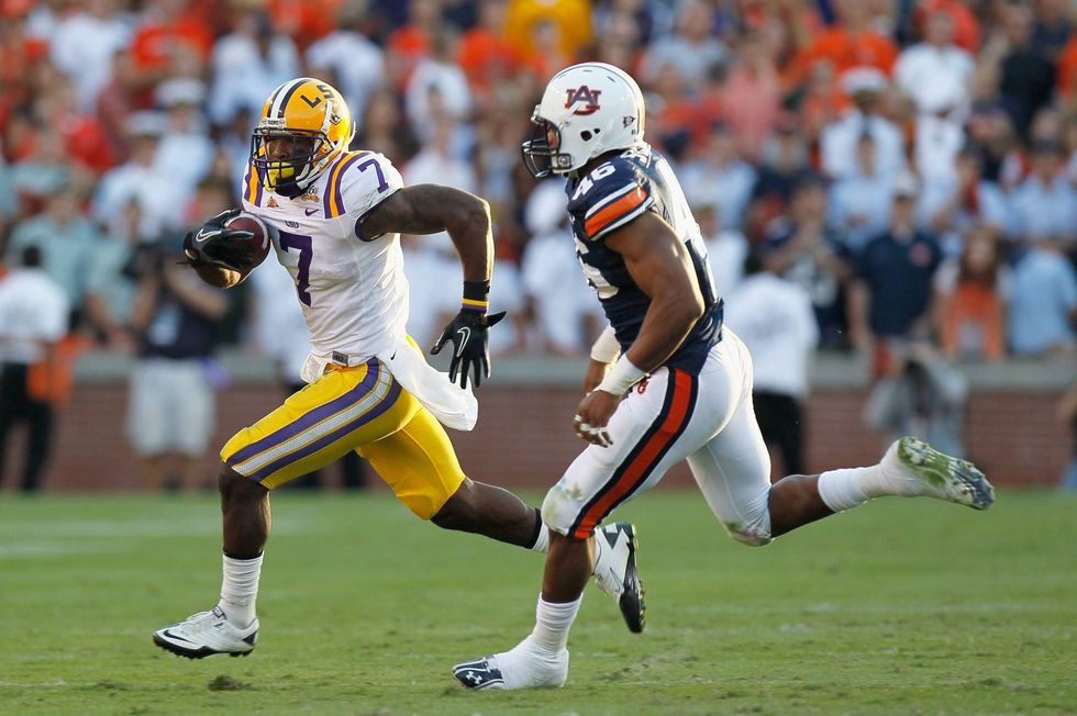 Patrick Peterson being chased by an Auburn defender