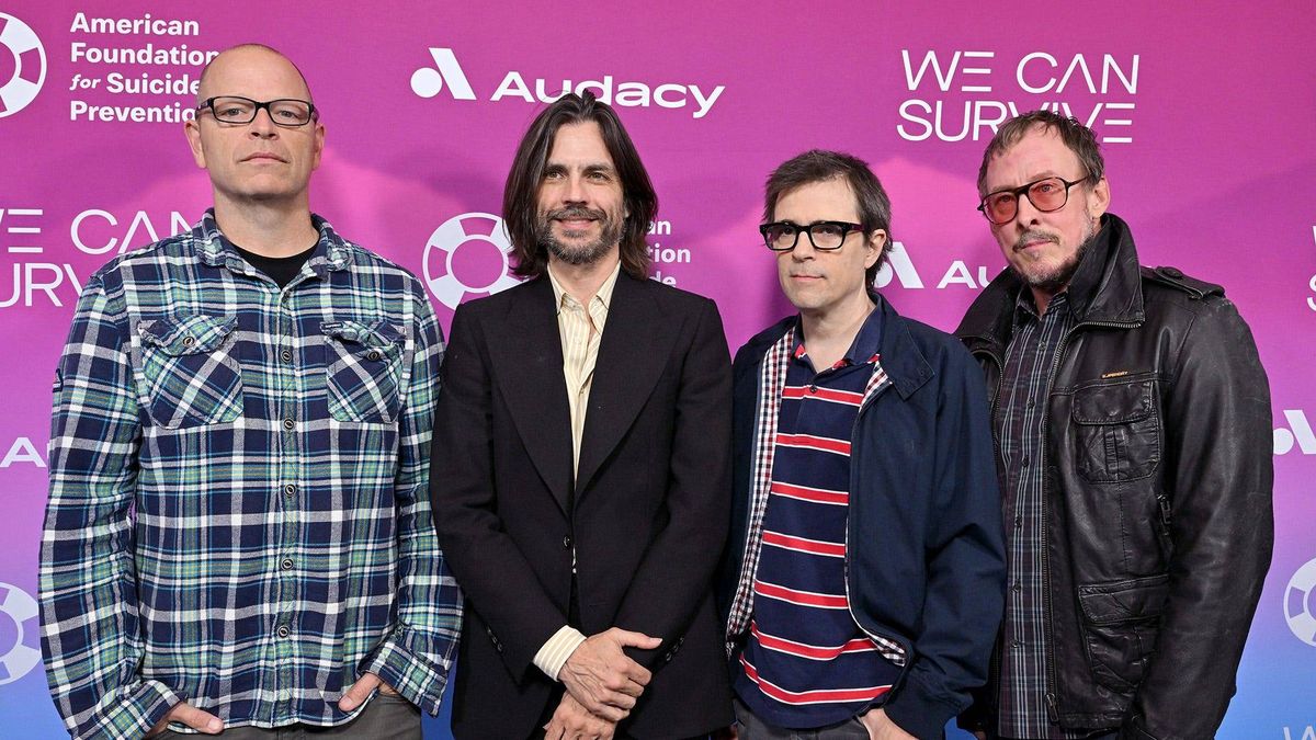 Patrick Wilson, Brian Bell, Rivers Cuomo, and Scott Shriner of Weezer