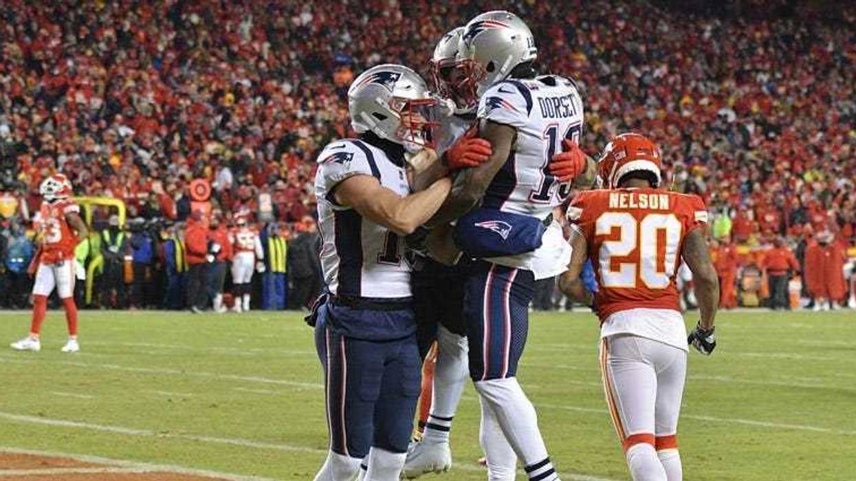 Patriots wide receiver Phillip Dorsett (13) celebrates with teammates after scoring a touchdown during the second quarter of the AFC Championship game against the Kansas City Chiefs on Jan. 20, 2019, at Arrowhead Stadium.