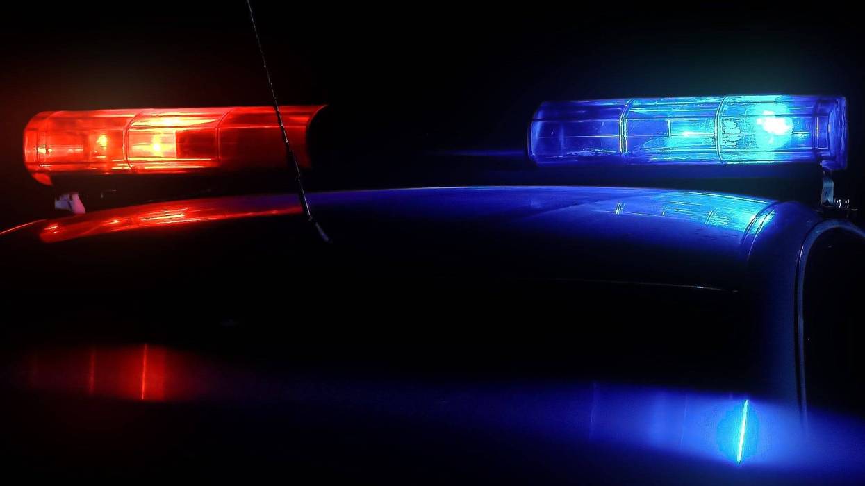 Patrol car with flashing lights - stock photo