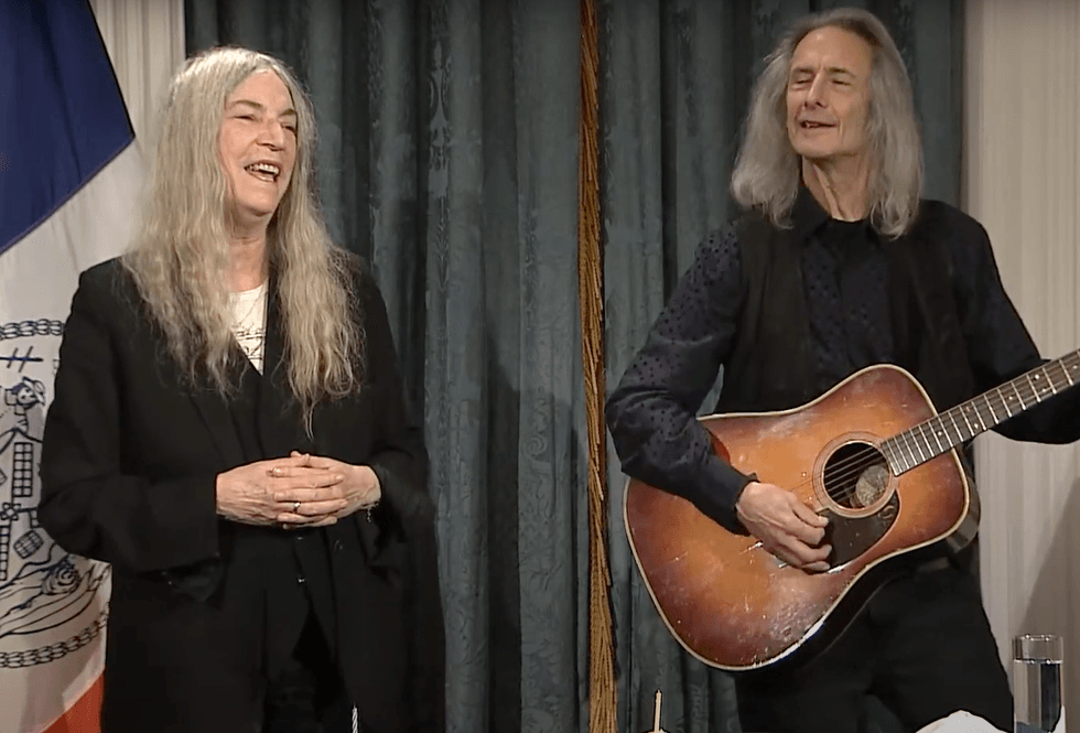 Patti Smith and Lenny Kaye perform at the mayor