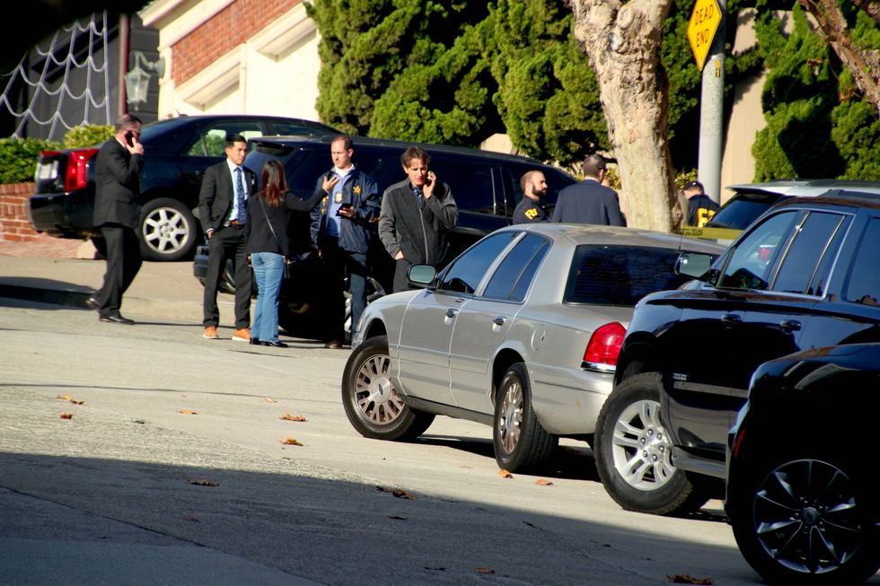 Paul Pelosi speaking with investigators on Friday.