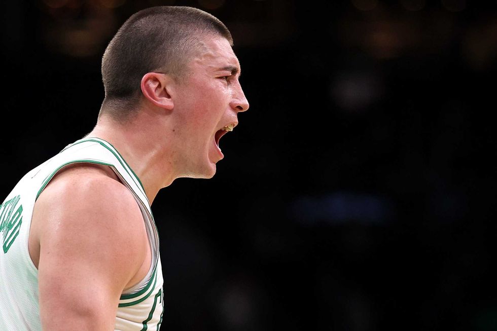 Payton Pritchard #11 of the Boston Celtics celebrates after scoring against the Portland Trail Blazers during the second quarter at TD Garden on March 05, 2025 in Boston, Massachusetts.