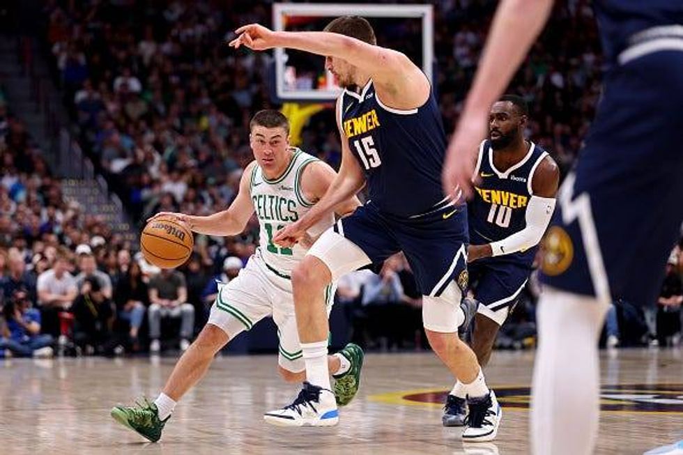 Payton Pritchard and Nikola Jokic